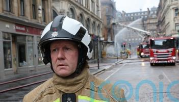 Firefighters&rsquo; &lsquo;huge effort&rsquo; stopped blaze spreading to hotel, officer says