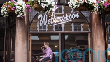 Wetherspoons warns that profits to be hit by rising costs