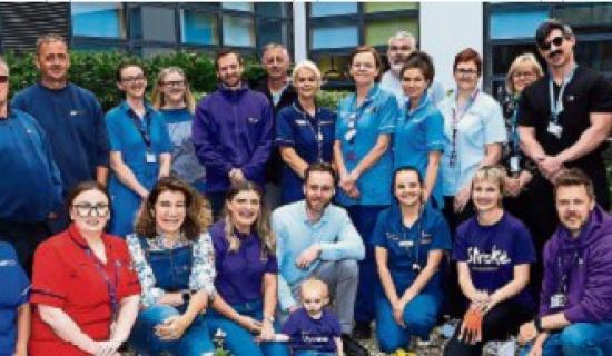Representatives from the Stroke Association, stroke survivors and medal staff at the Stroke Association Garden opening in Altnagelvin.