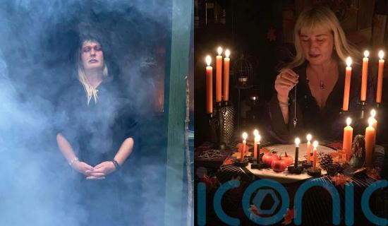 Witch claims to communicate with ancestors at Halloween through a silent meal, using tarot cards and pendulums