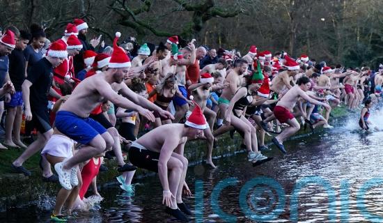 In Pictures: Hardy swimmers and royal watchers brave cold Christmas Day