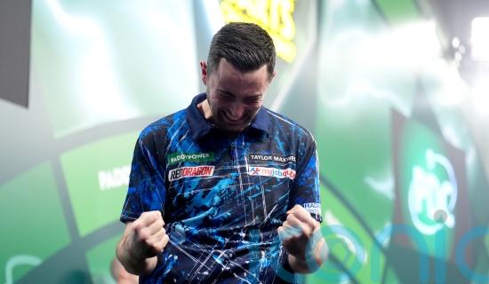 Luke Humphries survives scare as he reaches last 16 at World Championship