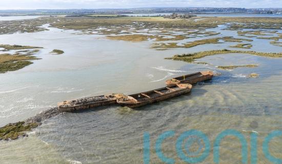 National Trust sinks three barges to form new island for birds