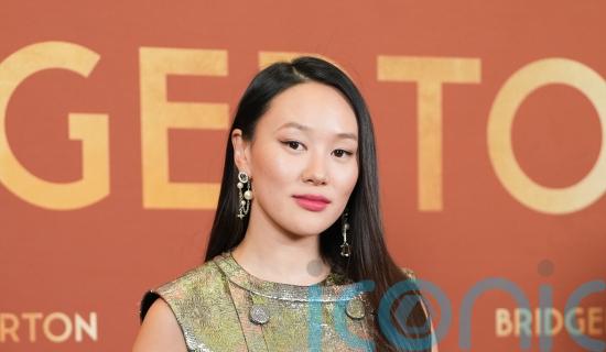 Yerin Ha wows crowd in metallic dress at special Bridgerton screening