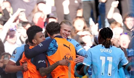 Erling Haaland shoots down Arsenal as Manchester City slash lead to three points