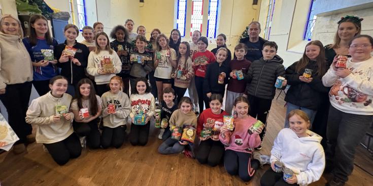 Inish Theatre Group brings some Christmas cheer, with donation to Buncrana SVP