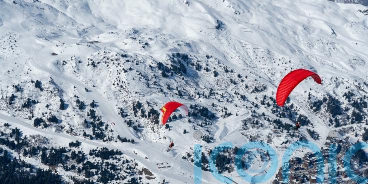 Paragliding above the French Alps: How to take your ski holiday to another level