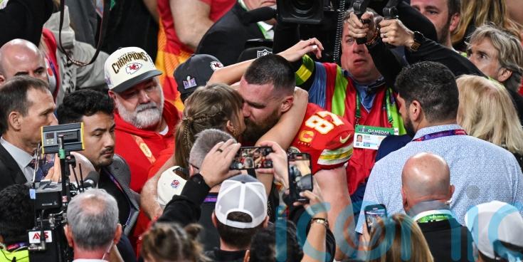 Travis Kelce says fiancee Taylor Swift helped motivate him to re-sign for Chiefs