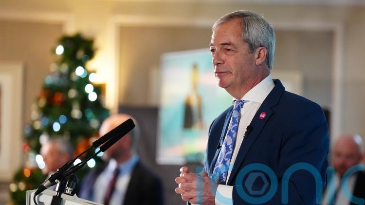 Farage urged to apologise by ex-schoolmates in letter amid racism allegations