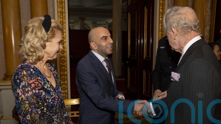 Charles meets survivors of Huntingdon train attack