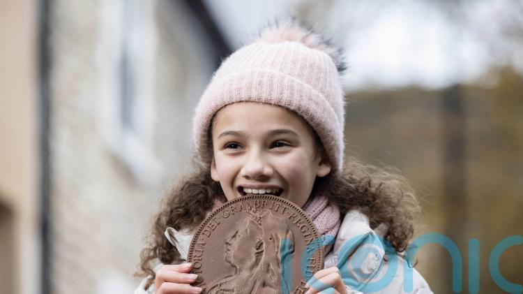 200th banking hub opens with chocolate coins marking the event