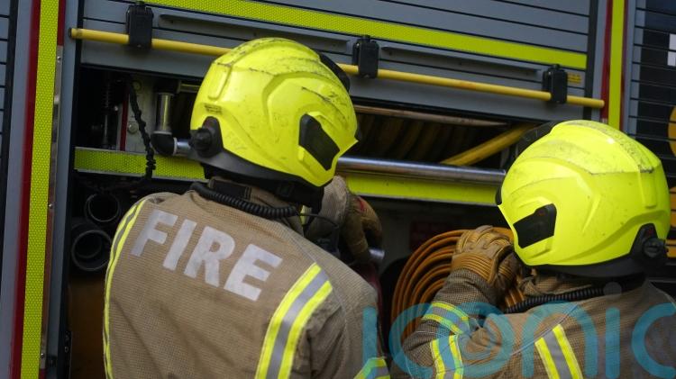Man and dog die after fire breaks out in block of flats