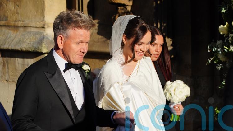 Holly Ramsay arrives to her wedding with famous father by her side