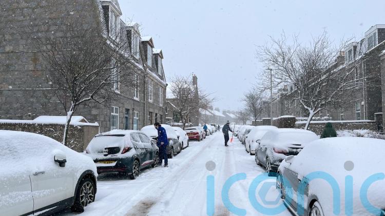 Schools closed and flights cancelled as warnings for snow and ice in force