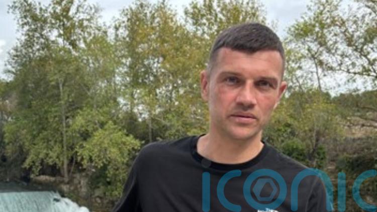 Police name &lsquo;much loved father&rsquo; who died after street incident as two charged