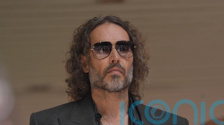 Russell Brand appears in court charged with further sex offences