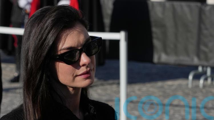 Anne Hathaway and Liz Hurley among celebrities at Valentino funeral in Rome