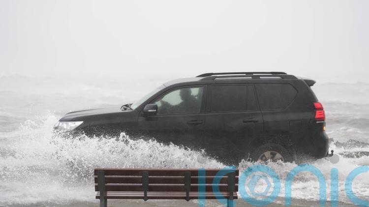 Schools shut and thousands without power as Storm Chandra hits island of Ireland