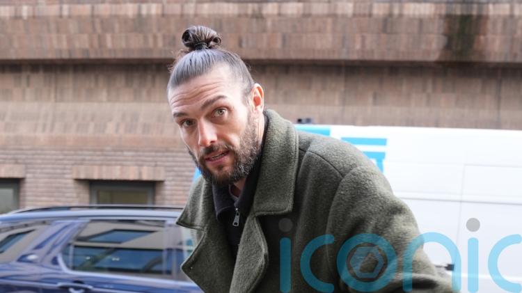 Footballer Andy Carroll faces trial over alleged breach of non-molestation order