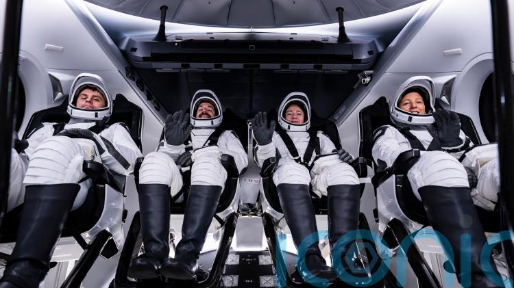 Four new astronauts arrive at International Space Station