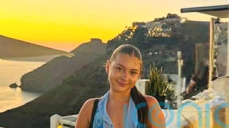 Woman killed when car collided with bus near Belfast named