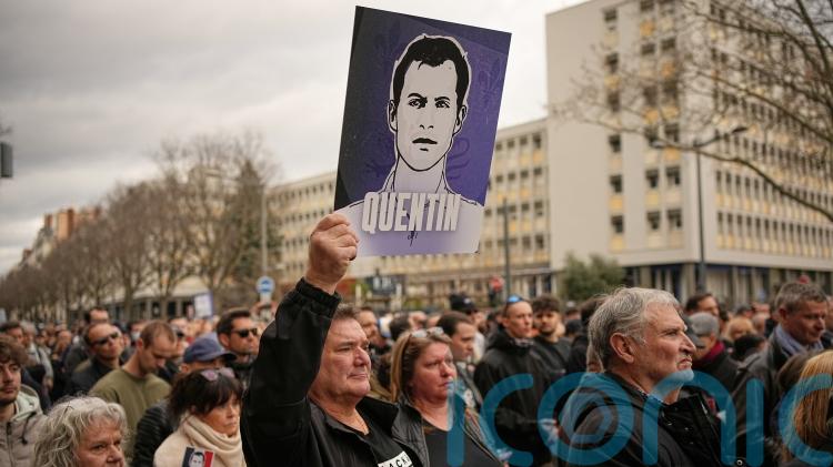 Hundreds march in Lyon in protest over activist&rsquo;s killing as Macron urges calm