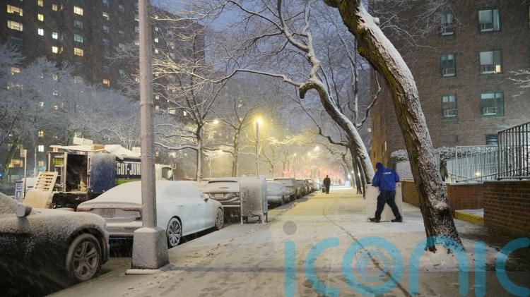 Travel ban and blizzard warnings as major storm hits north-east US