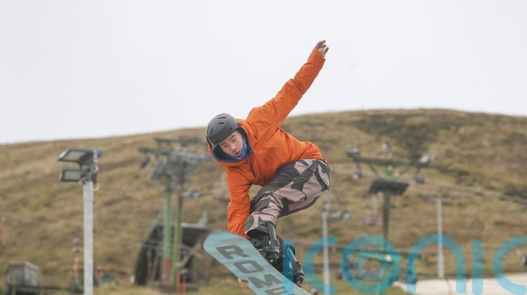 Snowboarder aims to be &lsquo;beacon of hope&rsquo; for MND as Paralympic dream comes true