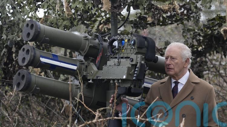 King takes part in air defence exercise and meets military families at barracks