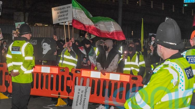 Vigil held for Iran&rsquo;s Khamenei as counter-protesters gather nearby