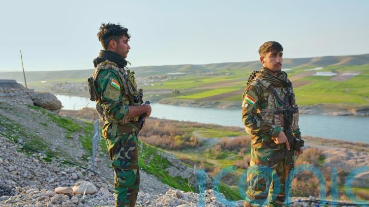 Kurdish Iranian dissidents deny attack plans but say they would join US invasion