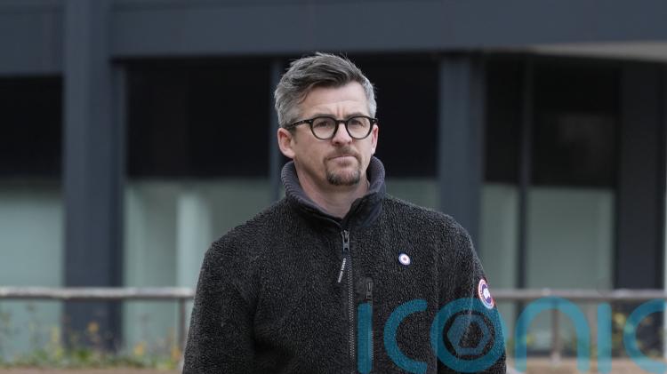 Ex-footballer Joey Barton appears in court charged with assault