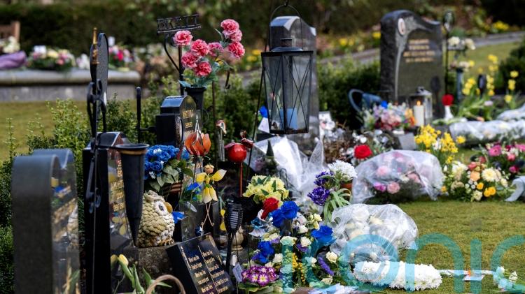 Flowers laid at graves of Dunblane victims as town marks 30 years since massacre