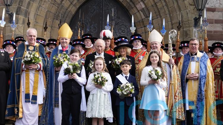 King presents Maundy gifts as service is held in Wales for only the second time