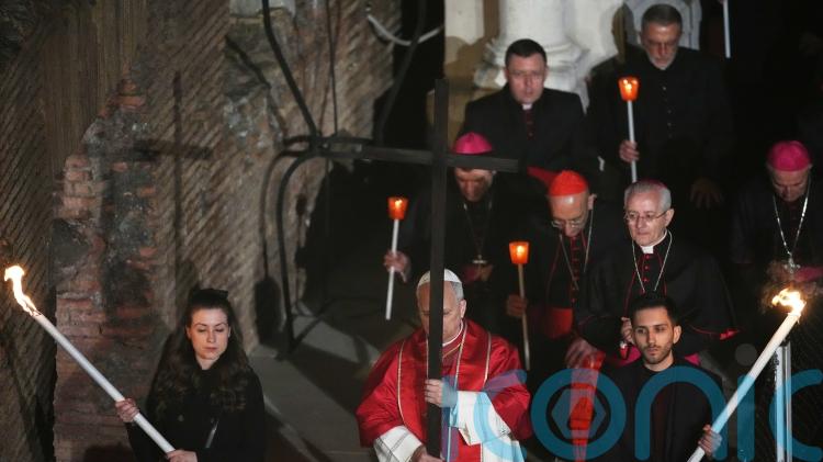 Pope first pontiff to carry cross for full Good Friday procession in decades