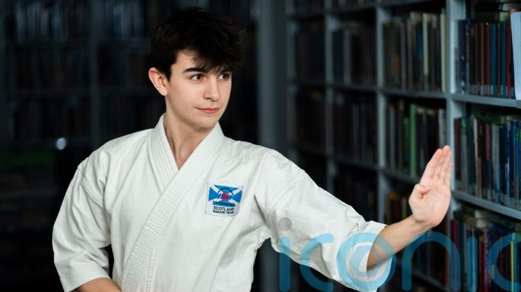 Boy who had collapsed lungs as child wins karate medal at world championships