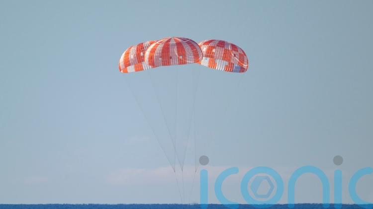 First manned Moon mission in more than 50 years splashes down after epic voyage