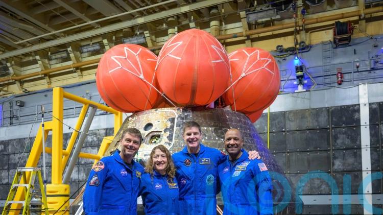 Artemis astronauts receive thunderous welcome home at Mission Control
