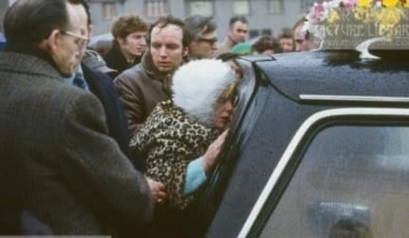 Ita McKinney at St Mary's Church, Creggan at the hearse of her husband, Gerry