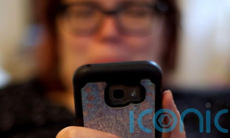 Children whose parents are glued to their phones see technology in more negative way