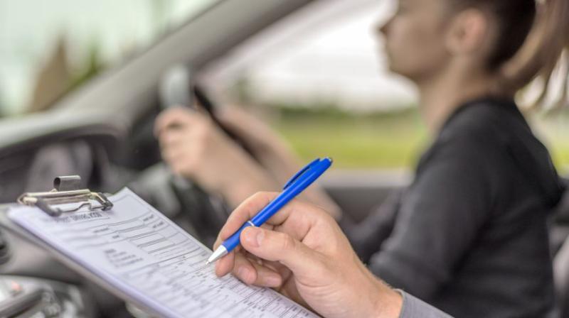 'Examiner took driving test with feet on dashboard'