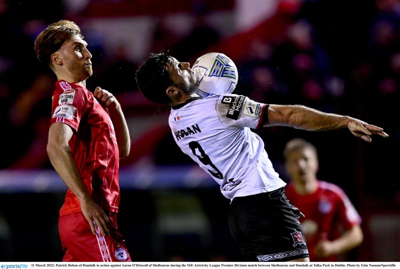 Patrick Hoban of Dundalk in action against Aaron O’Driscoll of Shelbourne