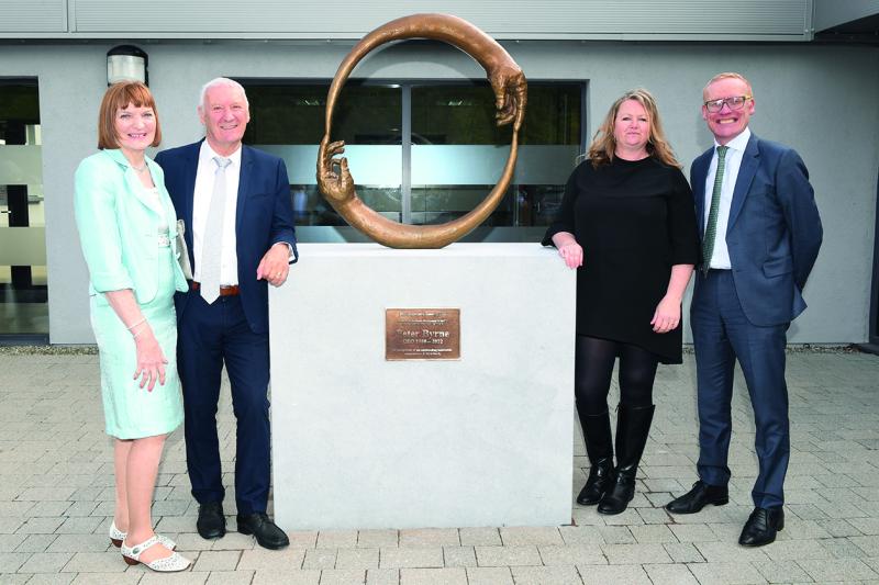 At the presentation of ‘The Co-operative Hands of FRS’ bronze sculpture to Peter Byrne on his retirement from FRS Network after 42 years of service are: (left to right) Joan Byrne, Peter Byrne, former