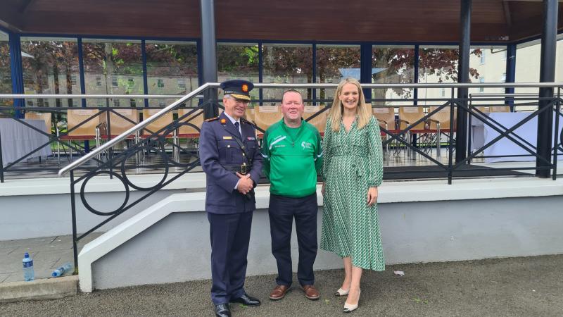 Templemore man Michael RYan pictured with Commissioner Harris and Minister Helen McEntee