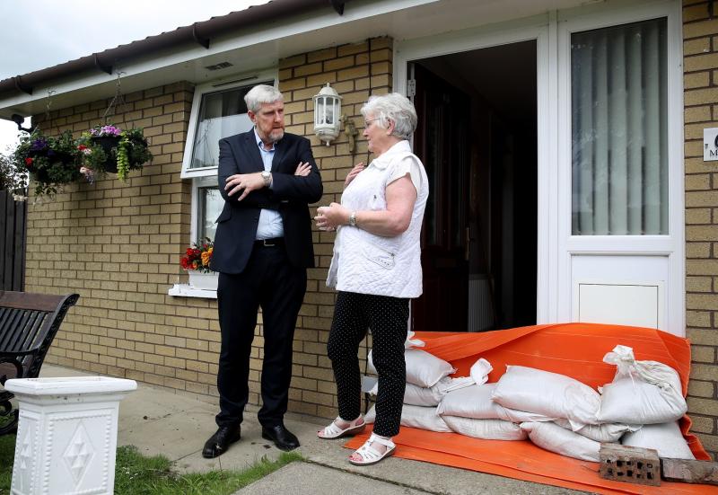 Minister visits flood-hit North West communities