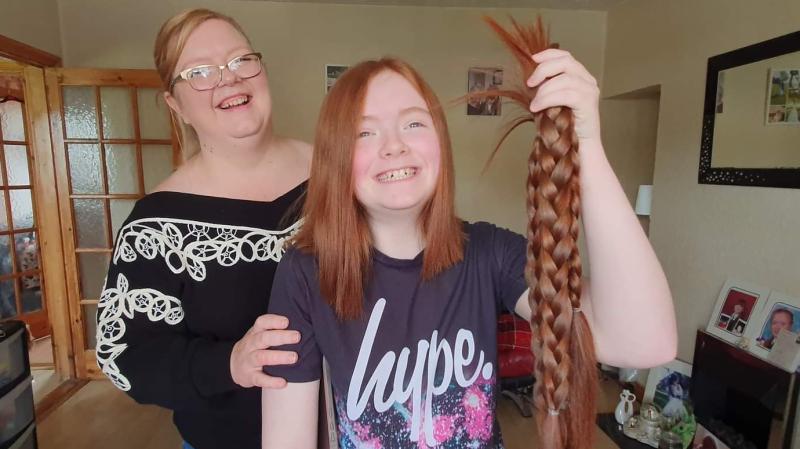 AFTER: A delighted Olivia shows off her new look.