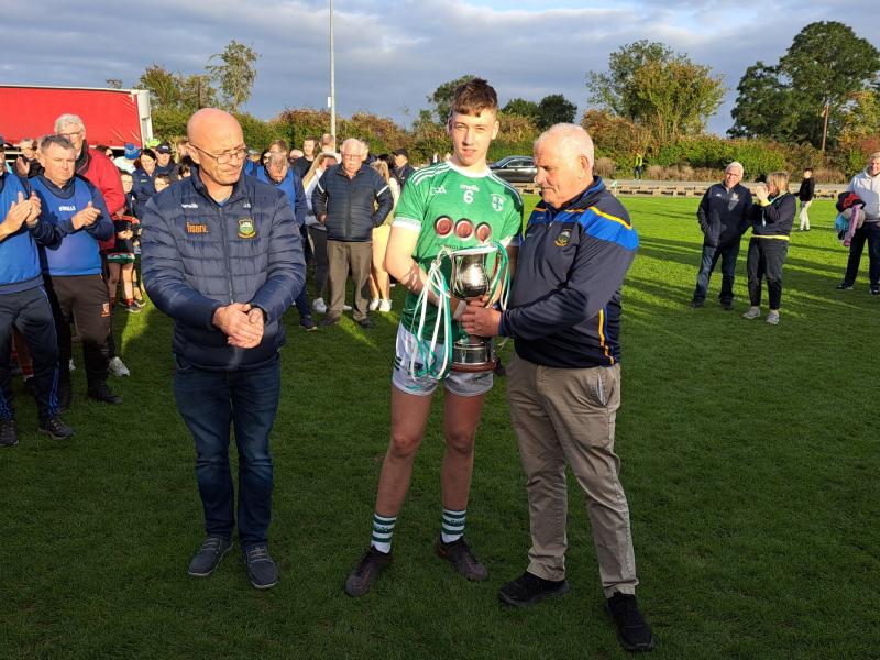 Holycross Ballycahill captain Jim Ryan accepts the silverware after his sides victory this afternoon