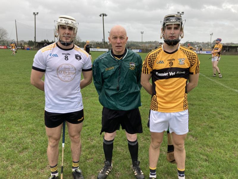 Referee Paddy Russell pictured with the team captains.
