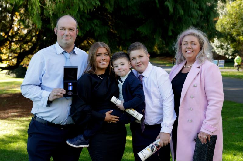 Pic shows Maartin and his wife Christine with their children Micheal Bourke , Katie Butler Haughney with their brother Daniel who received bronze medals at the Oiireachtas National Bravery awards