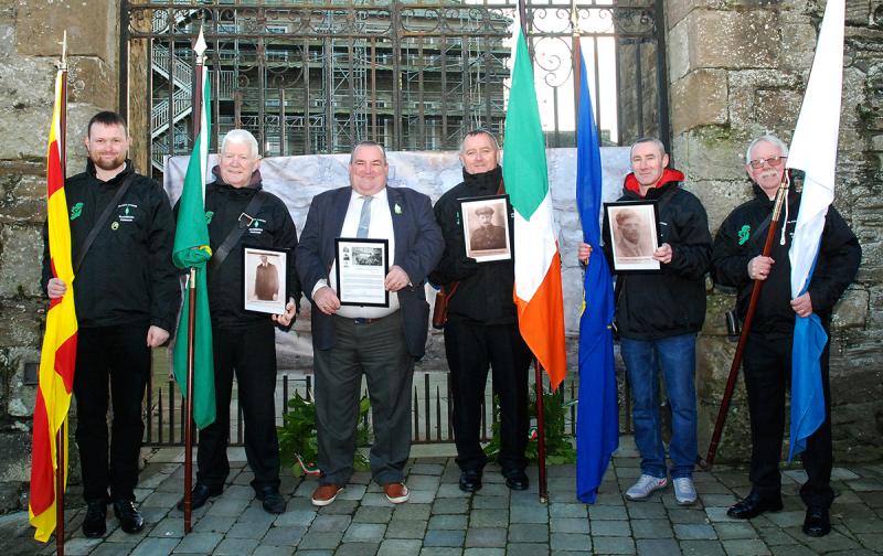 Deputy Martin Browne pictured with members of the colour party at the event on Sunday